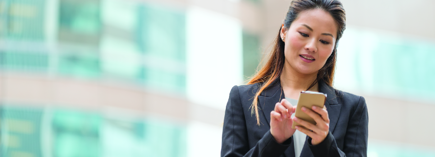 photo of lady looking at mobile phone